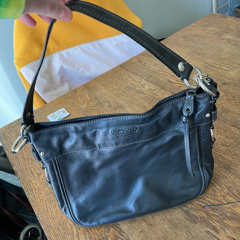 Coach bag. Super cute! Lots of pockets. Gently used.